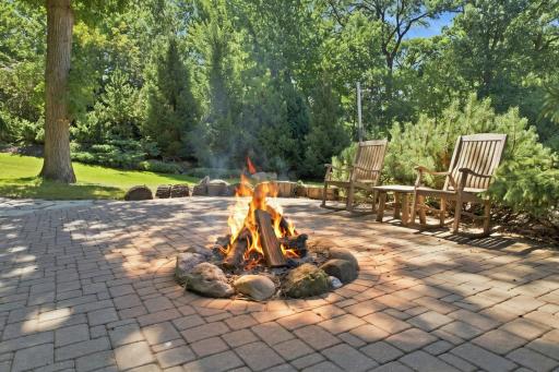Enjoy a campfire in your own back yard down near the pond.