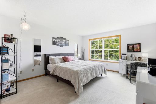 Large primary suite, large windows and plenty of room for armoirs, cozy reading nook!