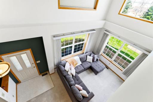 View of the living room and foyer from the loft space.
