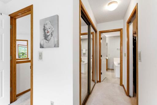 Two full closets leading to the primary bathroom.