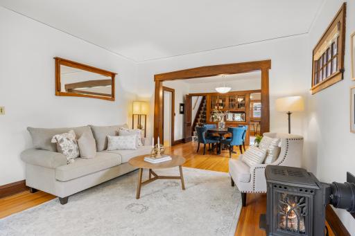 The charming gas fireplace stove creates a warm, inviting focal pointâperfect for gathering on cool Minnesota evenings.