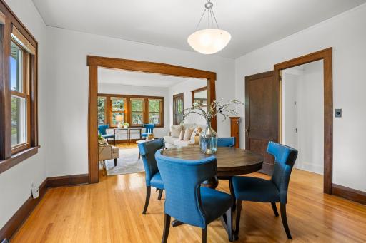 Anchored by gleaming oak hardwood floors and original woodworkflowing throughout the main floor.