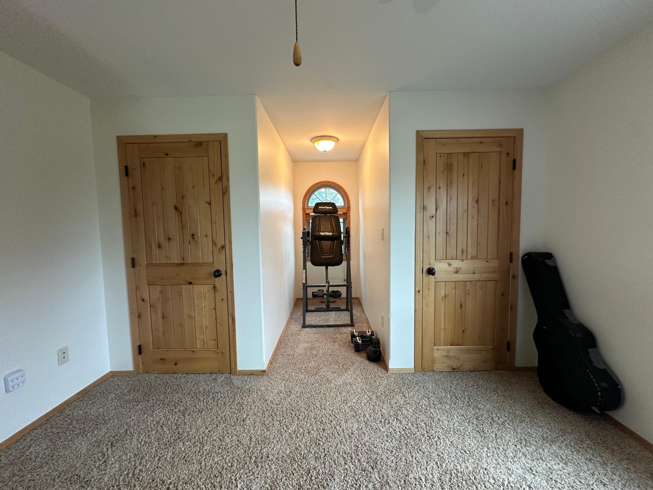 Upstairs bedroom dormer window and closets.jpeg