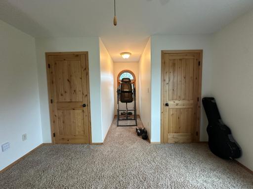 Upstairs bedroom dormer window and closets.jpeg