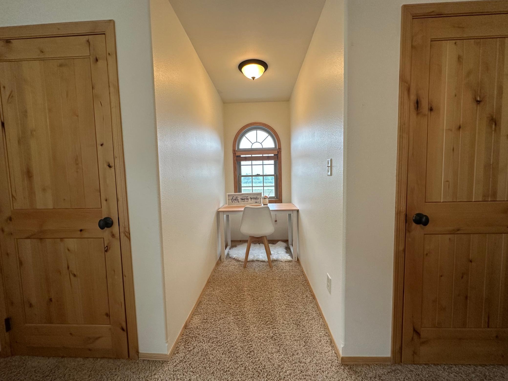 Upstairs bedroom dormer window and closets.jpeg