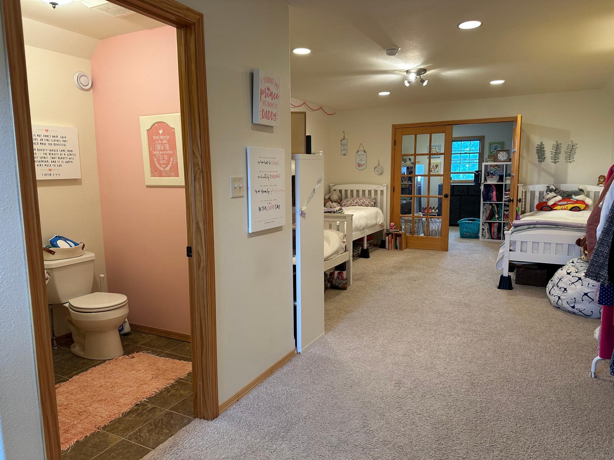 Bonus rooms above the garage with a half bathroom.jpeg
