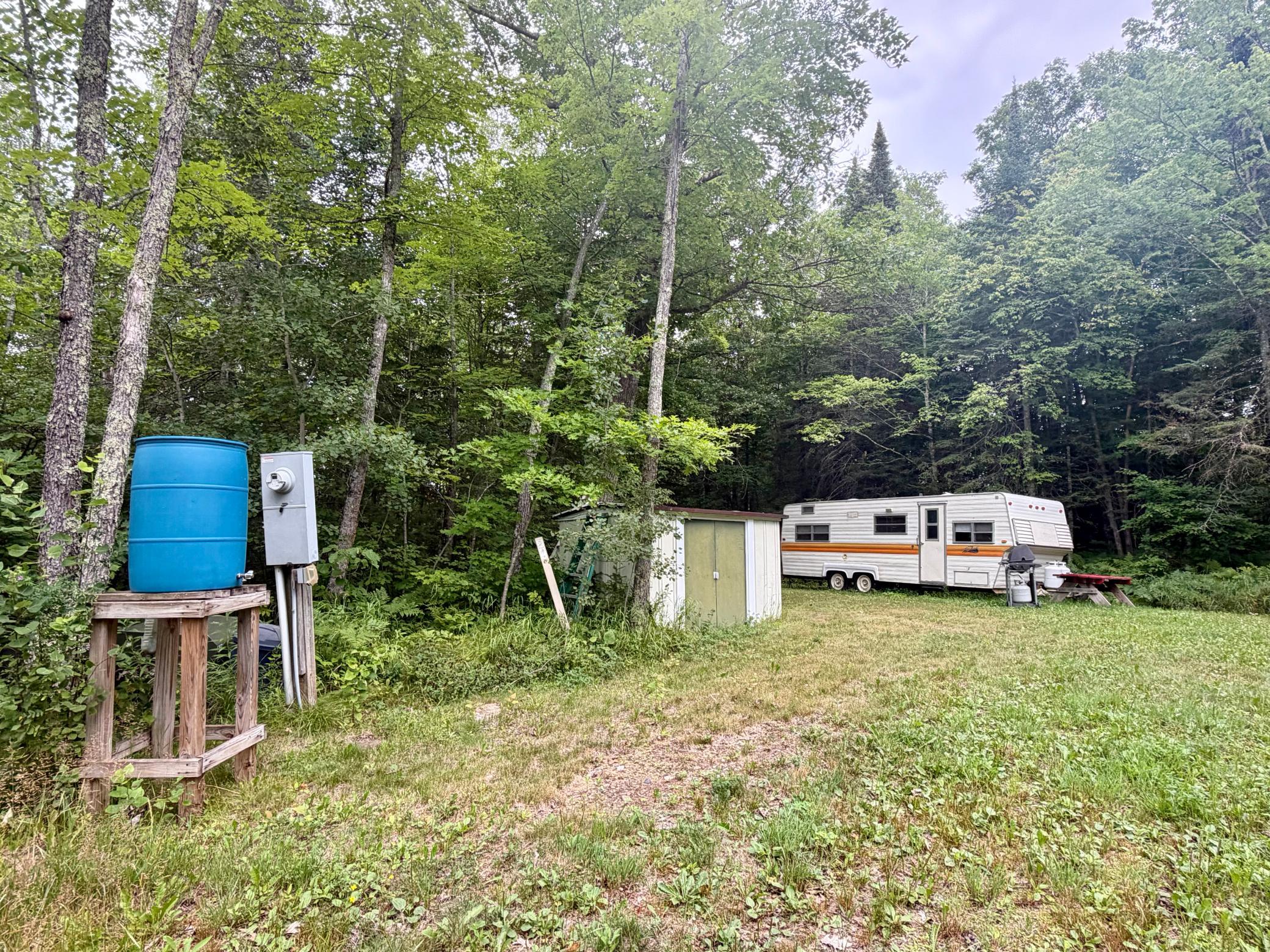 Livable camper 1976, well, electrict, outhouse