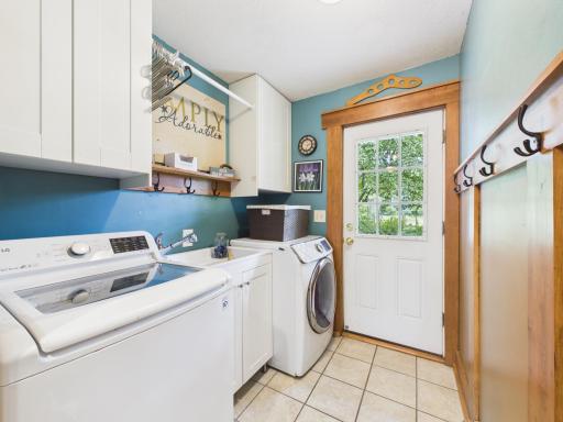 Laundry room with backyard access