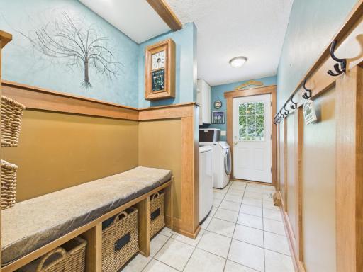 Convenient laundry room location between levels