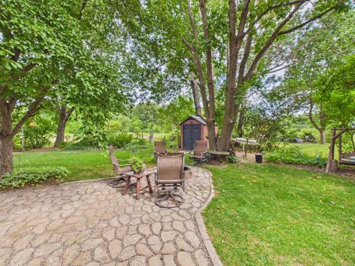 Paver fire pit and storage shed
