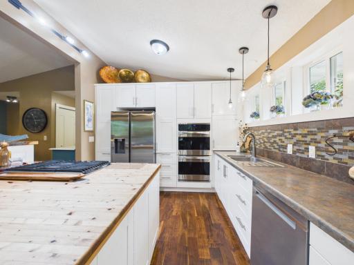 Stainless steel appliances including double wall ovens