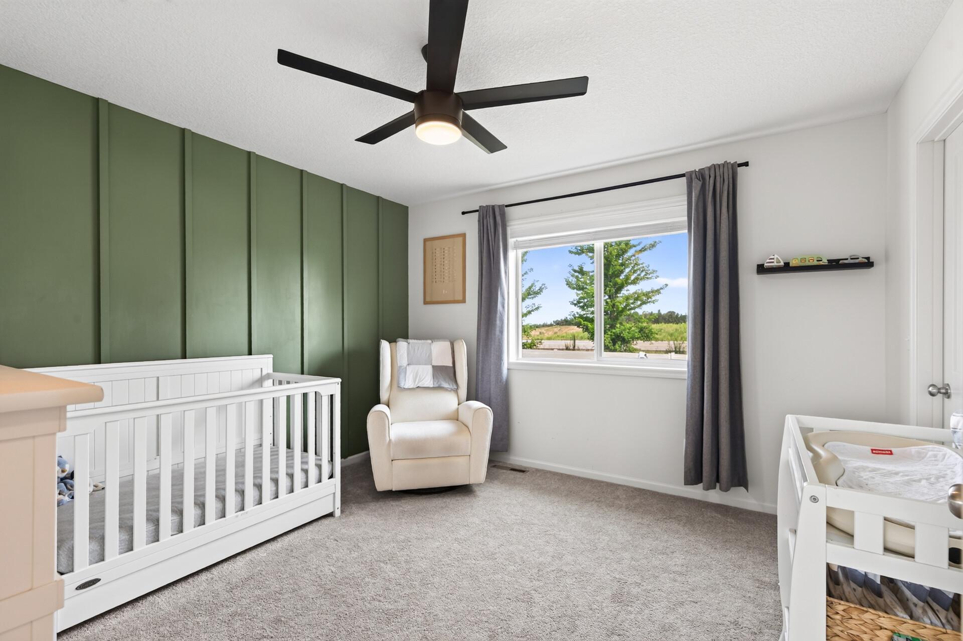 2nd bedroom on upper level with walk in closet