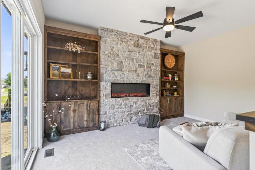 Full Stone wall surrounding Electric Fireplace