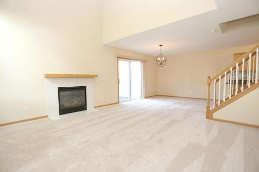 Vaulted Living Room and Patio off of Dining Area
