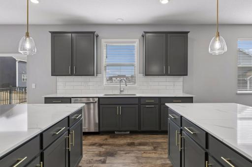 Kitchen window brings in natural light and views to the backyard