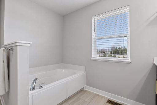 Primary bath soaking tub