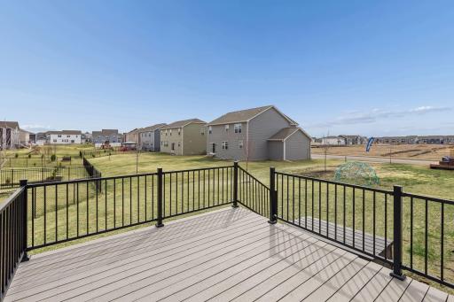 Deck overlooking backyard