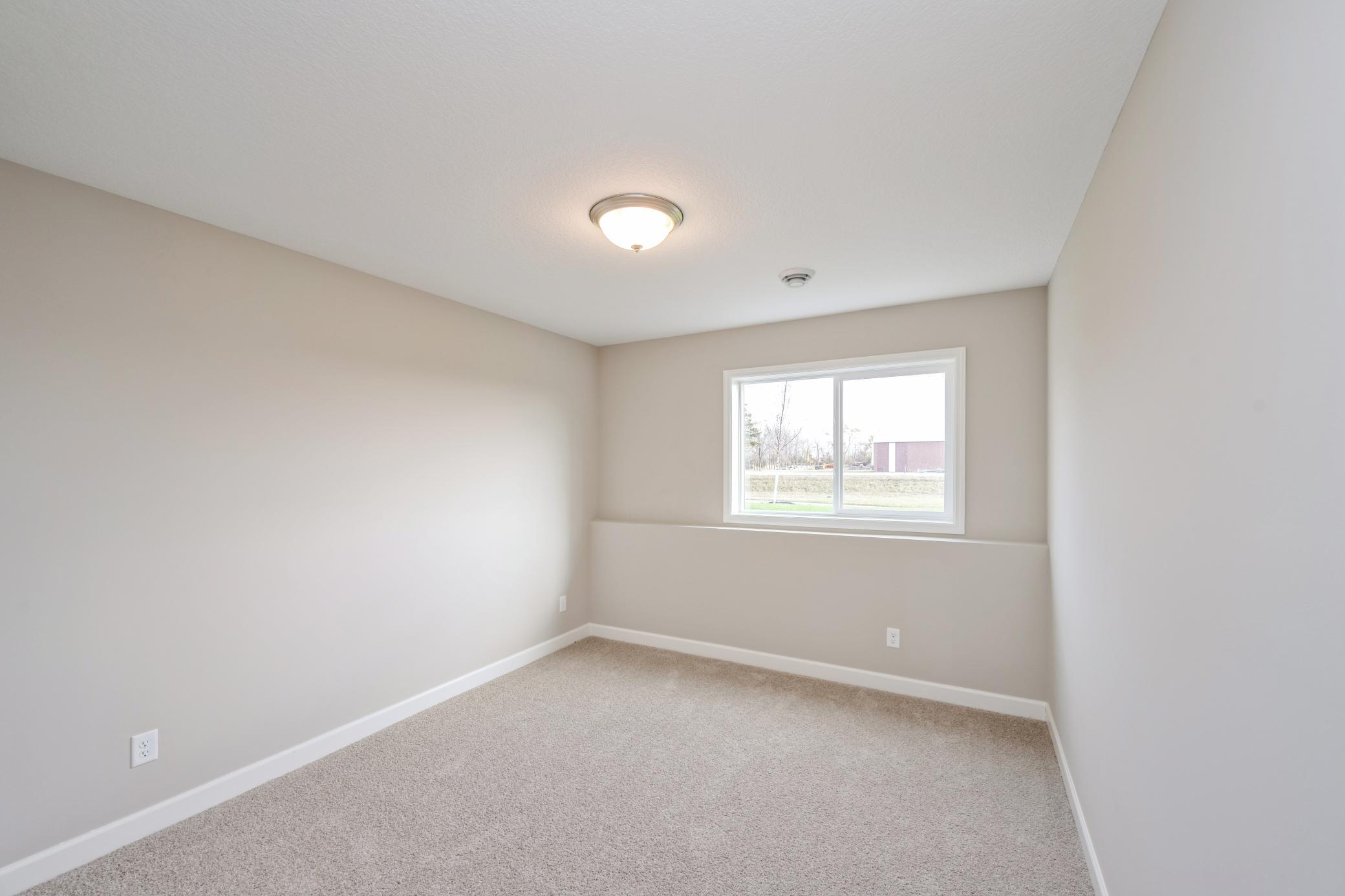 33 Lower level 5th Bedroom.jpg
