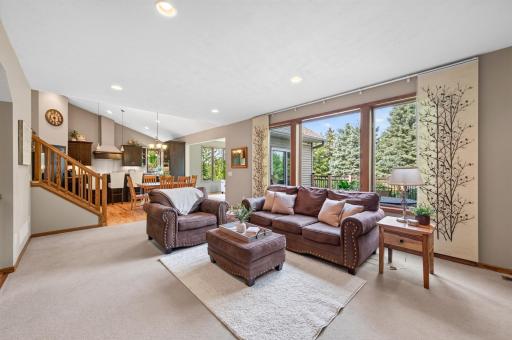 The large windows bring in light and beauty throughout the home