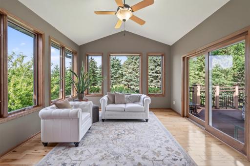 Amazing Sun Room with a walk out to the deck
