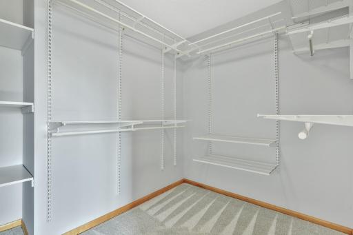 Main Level Primary Bedroom Large Walk-In Closet with Organizers