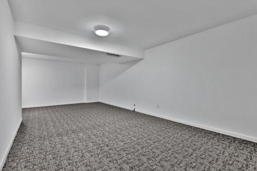 Lower Level Bonus Room with multi purposes! Games - Media Room - Craft/Office Space - Storage