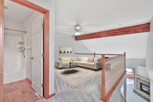 Upper Level Loft features additional Living/Office/Hobby Space - with Full Bath and Large Bedroom for Guests or multigenerational living - Virtually Staged