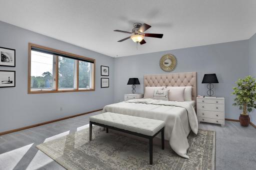 Spacious Main Level Primary Bedroom - Walk In Closet - Large Bath - Separate Tub and Shower - Laundry Closet - Ceiling Fan - Virtually Staged