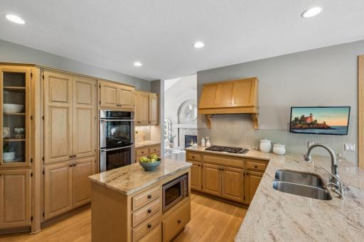 This chef's kitchen features a Wolf gas range and Vent-A-Hood and an Electrolux electric double oven