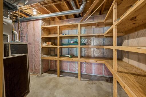 The utility room has fantastic built in storage. You will not run out of places to store your items in this home!