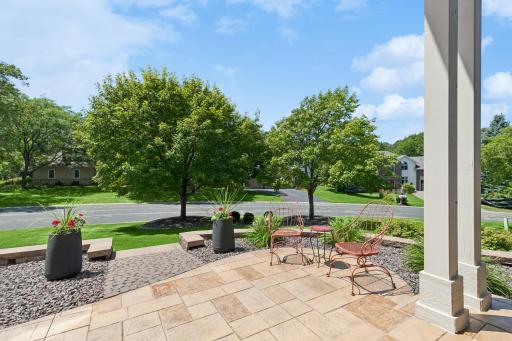 Front patio with new stamped concrete patio and landscaping