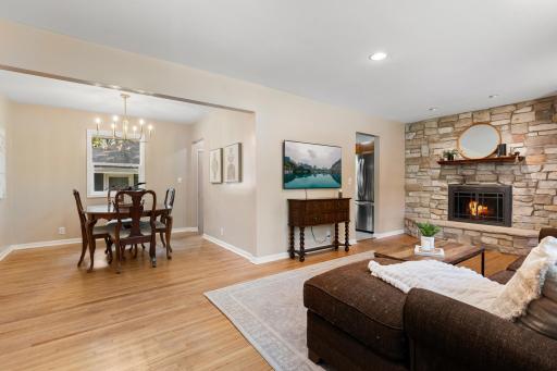 Living room connects to the dining room and kitchen