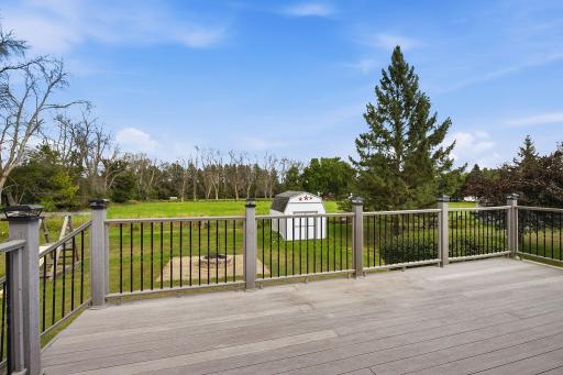 This huge deck is maintenance free with great country views.