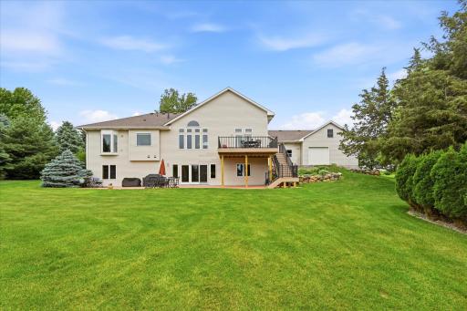 Multiple outdoor gathering spaces create endless opportunities to enjoy the property's natural surroundings.