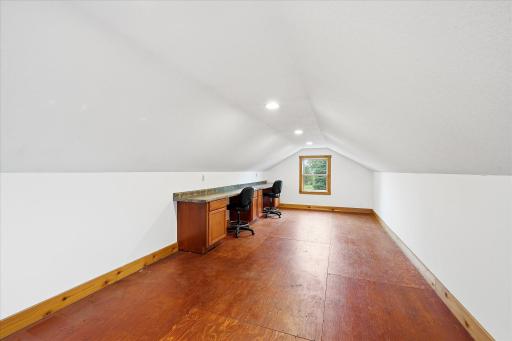 Spacious 36' x 12' bonus room above the garage offers endless possibilities for hobbies, creative pursuits, fitness equipment, workspace, or storage.