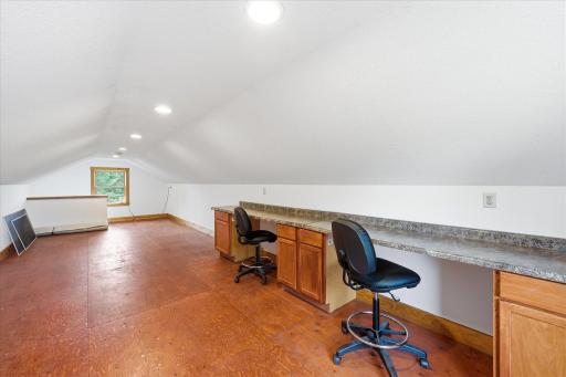 Spacious 36' x 12' bonus room above the garage offers endless possibilities for hobbies, creative pursuits, fitness equipment, workspace, or storage.
