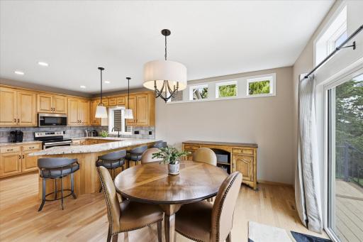 Custom cabinetry, beautiful countertops, and stainless steel appliances create a kitchen that is as functional as it is attractive.