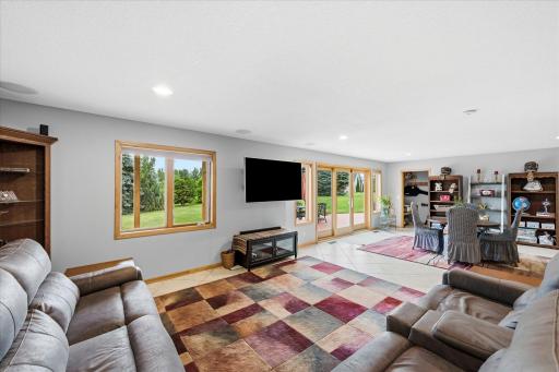 Spacious recreation room offers flexibility for a variety of activities and furnishings.