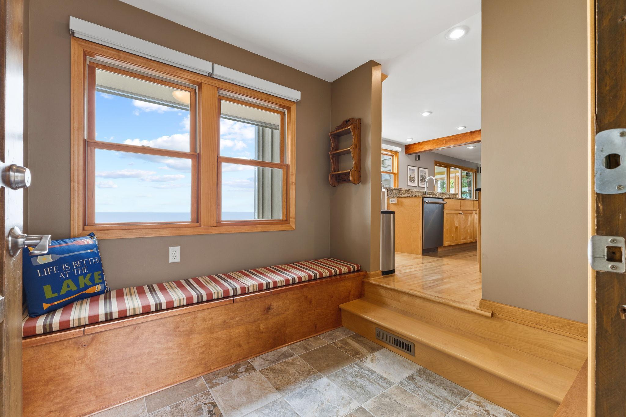 The welcoming entry offers convenient storage and provides seamless access to the kitchen, creating a functional and inviting first impression.