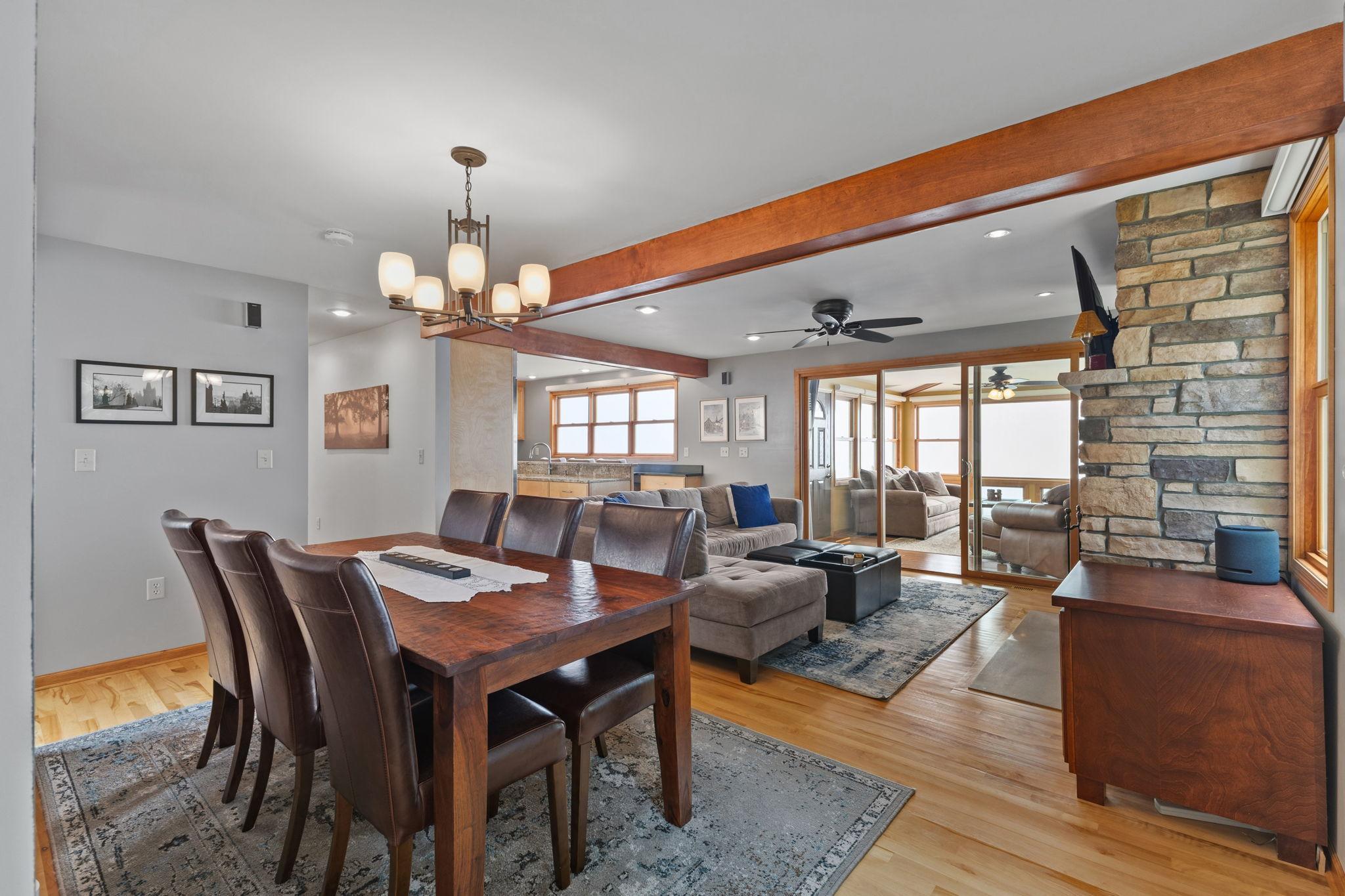Host dinners or holiday gatherings in the generous dining space, enhanced by exposed wood beams and easy access to the adjoining living areas.