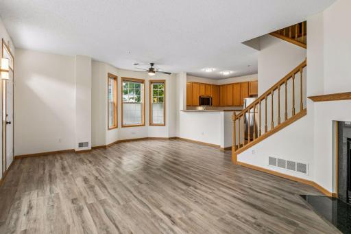 Open main level with breakfast bar and eating area.