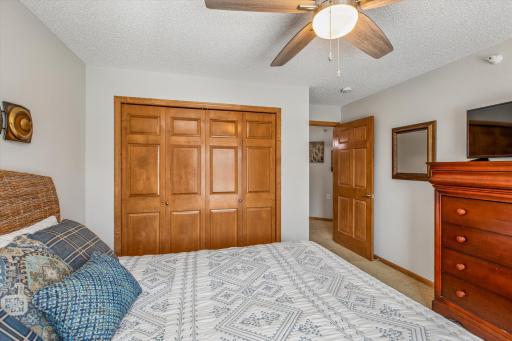Second bedroom adjoins full hallway bath with laundry room right across the way.