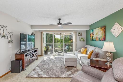 Spacious living room. Walkout to eye pleasing deck views.