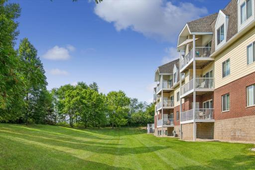 Look for the top floor gray sun umbrella! Vaulted ceiling over the maintenance free deck offering great views!