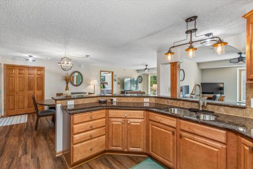 Coat closet at entry. Window views from everywhere in the kitchen