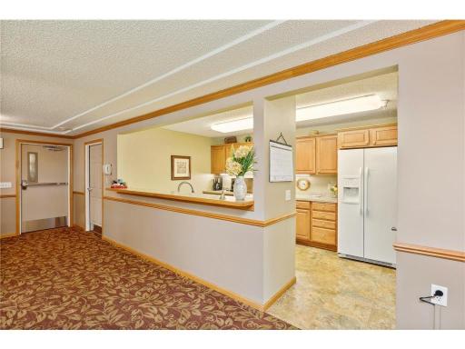 Full kitchen in community gathering area makes entertaining a breeze!