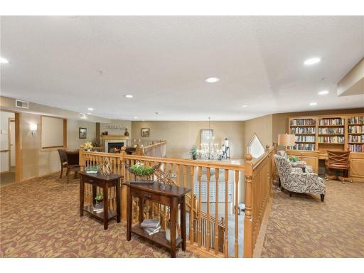 Above the main floor gathering area you'll find reading spot, game tables and a place to relax.
