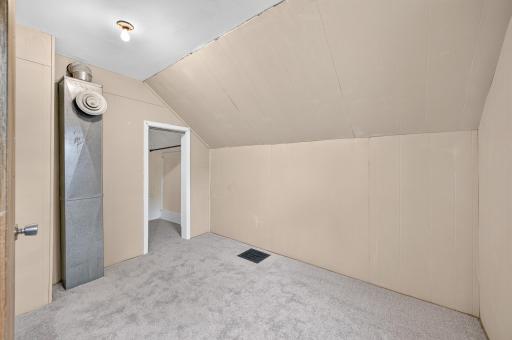 Third upper-level bedroom makes a great kids bedroom, office or creative space.