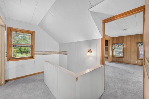 Upper level features fresh paint, new carpet and three additional bedrooms.