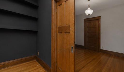 2-1/4 INCH THICK (!!) Sliding pocket door leading to the first bedroom/den option.
